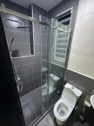 Koupelna v ubytování Gbade's Condo F18