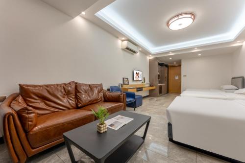Posezení v ubytování JunHome International Apartment-Beijing Rd A-mall
