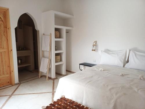 Cama o camas de una habitación en Riad DabaKech