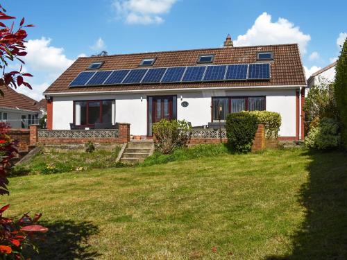 a house with solar panels on the roof at Ballyholme in Skelton
