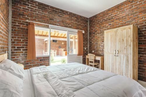 Postel nebo postele na pokoji v ubytování Monik Guest House