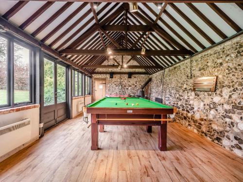 a room with a pool table in it at White House Farm in Sedgeford