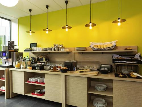 Køkken eller tekøkken på Aparthotel Adagio Access Paris Reuilly