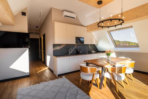 TV a/nebo společenská místnost v ubytování Góralski Resort 2 z Basenem