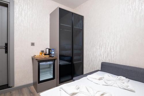 Una cama o camas en una habitación de The Port Güzelyalı