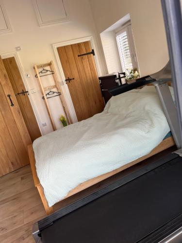 Postel nebo postele na pokoji v ubytování The Jeep House in the Area of Outstanding Natural Beauty