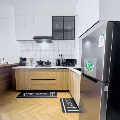 Kuchyň nebo kuchyňský kout v ubytování Indesign makumbi Apartment