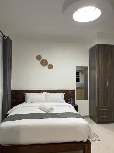 a bedroom with a large bed in a room at Ckay homes eldoret in Eldoret