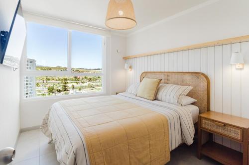 Ένα ή περισσότερα κρεβάτια σε δωμάτιο στο Departamento Playero en Peñuelas