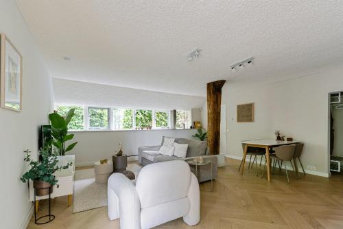 Posezení v ubytování B&B Cosy Woods - stijlvolle suites aan het bos!