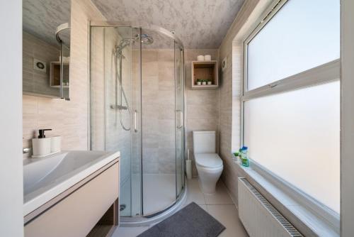 a bathroom with a shower and a sink and a toilet at Amazing Studio in Central London - 5 in London