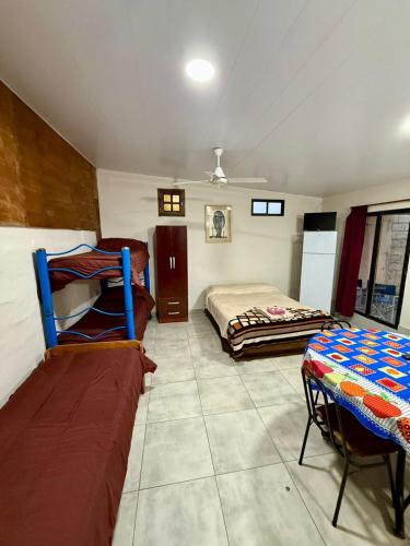 Postel nebo postele na pokoji v ubytování Complejo Corrientes Dpto 5