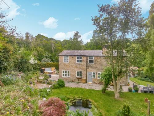 an aerial view of a house with a garden at Humford Mill Cottage in Bedlington