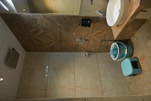an overhead view of a shower in a bathroom at Mountain Berries Resort in Panchgani