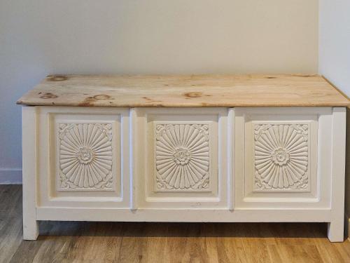 a white cabinet with a wooden counter top at Mercure Barcelona Condor in Barcelona