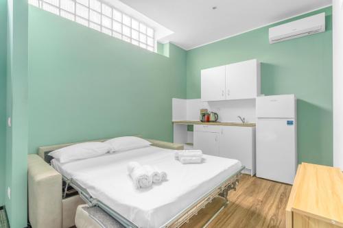 Kuchyň nebo kuchyňský kout v ubytování new cozyflat free wifi e AC 7 min Rho fiera