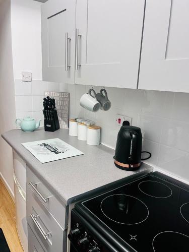 Kuchyň nebo kuchyňský kout v ubytování Rubys apartment
