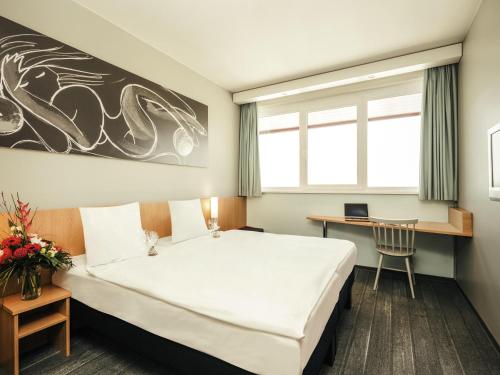 Cama o camas de una habitación en Ibis Vienna Airport