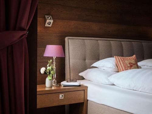 Postel nebo postele na pokoji v ubytování Hotel Sandhof