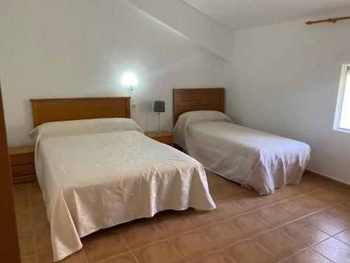 Ένα ή περισσότερα κρεβάτια σε δωμάτιο στο Casa azul