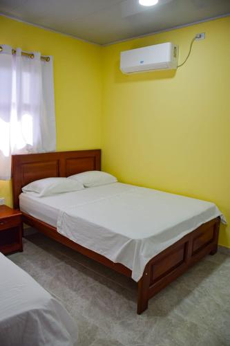 Letto o letti in una camera di Hotel CASA LENA