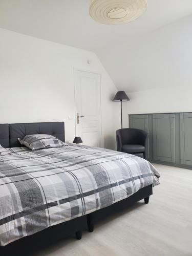 Postel nebo postele na pokoji v ubytování L envol