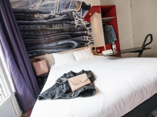 Un ou plusieurs lits dans un hébergement de l'établissement ibis Styles Lille Centre Grand Place