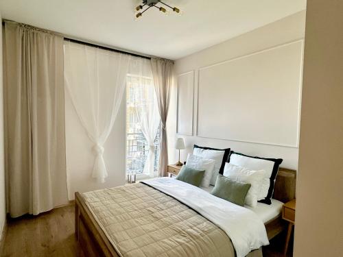 Postel nebo postele na pokoji v ubytování Magic Place III - Francuska Park - Free Garage - Self Check-in