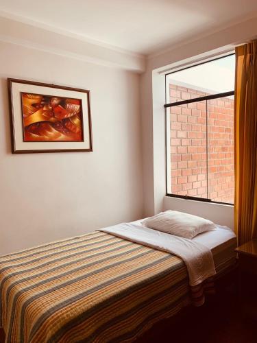 Cama o camas de una habitación en Hotel Silver