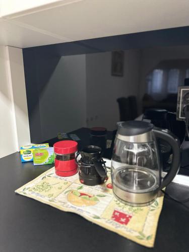 a blender sitting on top of a table at Apartman Feniks in Sjenica