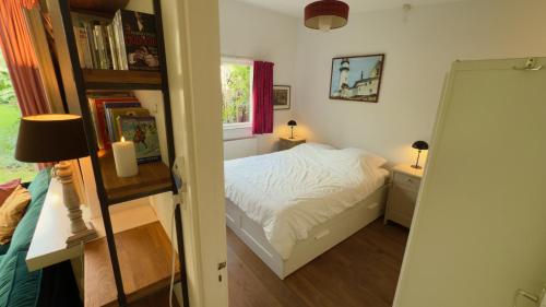 Ένα ή περισσότερα κρεβάτια σε δωμάτιο στο De Boem