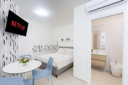 Postel nebo postele na pokoji v ubytování Residence Le Sirene