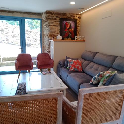 Гостиная зона в A Casa da Fonte Azul