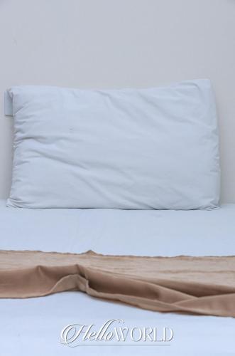Un ou plusieurs lits dans un hébergement de l'établissement World Hotel Downtown
