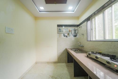 Kuchyň nebo kuchyňský kout v ubytování Sukoon Ghar By Natures Sweet Homes