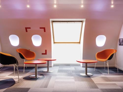 Χώρος καθιστικού στο ibis Styles Paris Velizy