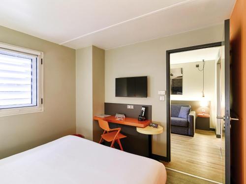 Televisyen dan/atau pusat hiburan di ibis Styles Lyon Centre Confluence