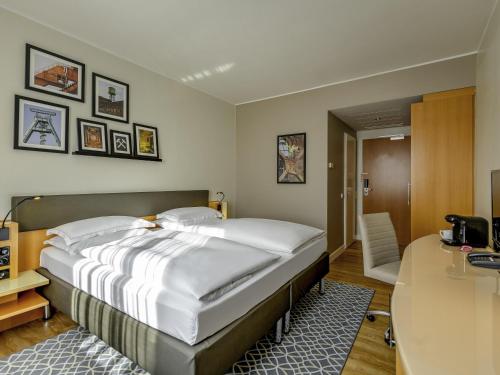 Katil atau katil-katil dalam bilik di Mercure Hotel Bochum City