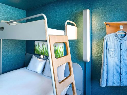 Un ou plusieurs lits dans un hébergement de l'établissement ibis budget Strasbourg Sud Illkirch