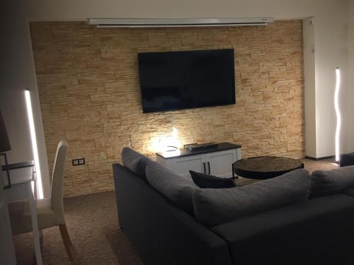 Μια τηλεόραση ή/και κέντρο ψυχαγωγίας στο Vulkán Wellness Panzió Pécs