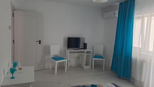 Μια τηλεόραση ή/και κέντρο ψυχαγωγίας στο Aquamarin iulius mall studio