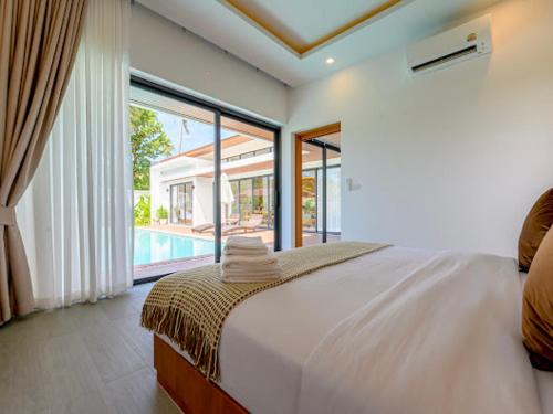 Ένα ή περισσότερα κρεβάτια σε δωμάτιο στο Sunny Hills Villa