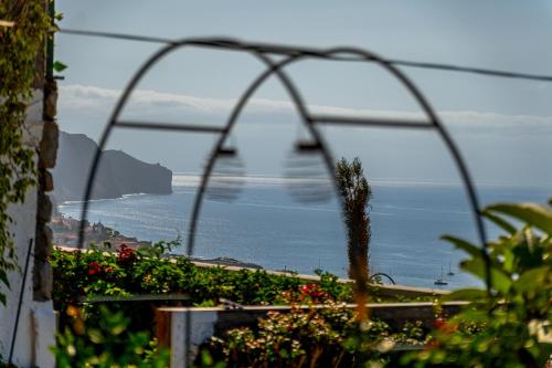 a view of the ocean from a balcony at Apartments Vista Oceano in Funchal