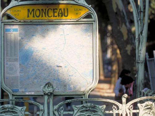 a sign with a map on it in a park at hotelF1 Paris Saint Denis Université in Saint-Denis