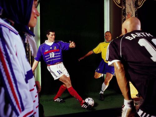 a group of men playing a game of soccer at hotelF1 Paris Saint Denis Université in Saint-Denis