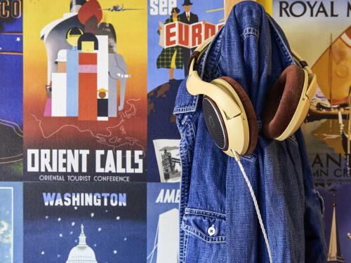 a pair of headphones hanging from a denim jacket at hotelF1 Toulouse Aéroport in Blagnac