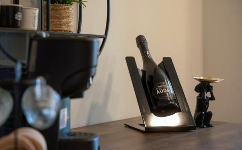 a bottle of wine sitting on top of a table at Casa Bauta in Venice