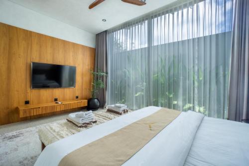 Ένα ή περισσότερα κρεβάτια σε δωμάτιο στο Rahya Villas Complex