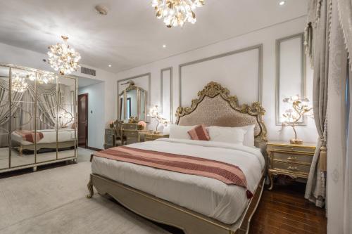 Postel nebo postele na pokoji v ubytování 83rd Floor Luxurious Penthouse Full Sea View 6 BHK