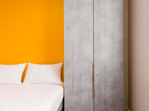 Un ou plusieurs lits dans un hébergement de l'établissement ibis budget Strasbourg La Vigie